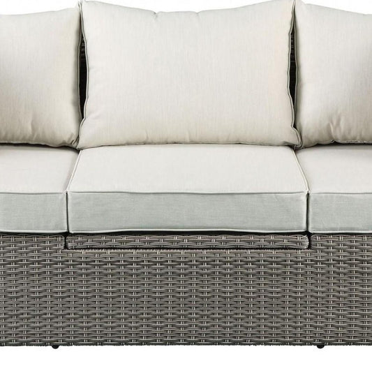 Three Piece Outdoor Gray Wicker Sectional Seating Group with Beige Cushions
