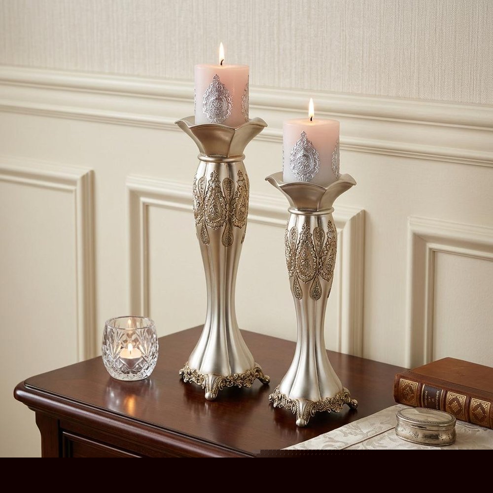 Set of Two Silver Metallic Polyresin Ornate Tabletop Pillar Candle Holders With Candle