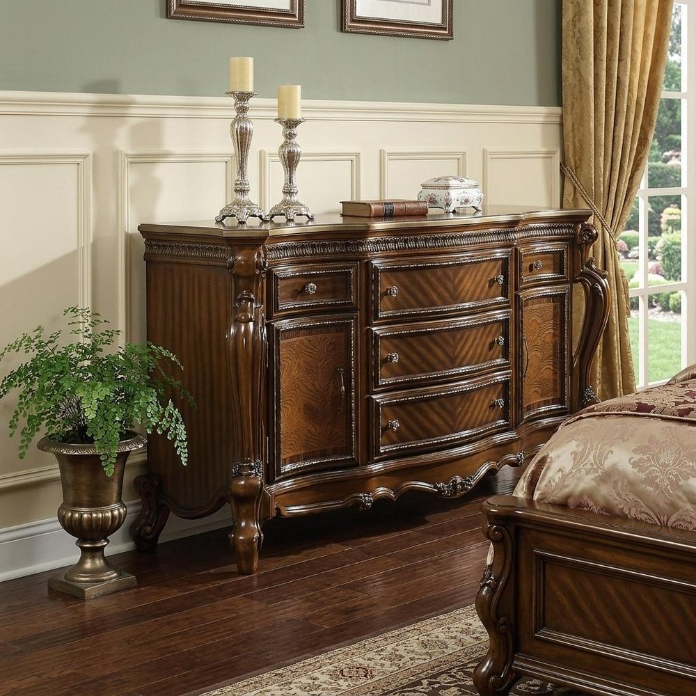 69" Brown Solid and Manufactured Wood Five Drawer Triple Dresser