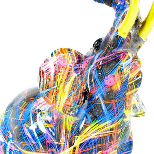 7" Blue Yellow And Pink Resin Elephant Tabletop Sculpture
