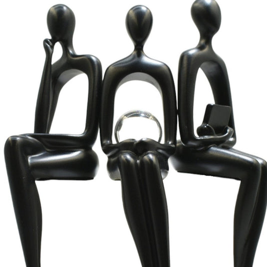 Set of Three Black Resin People Tabletop Sculpture