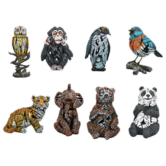 Set of Eight Brown White And Black Resin Wilderness Tabletop Sculpture