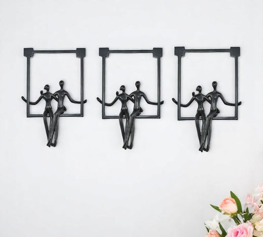Set of Three Black Resin People Tabletop Sculpture