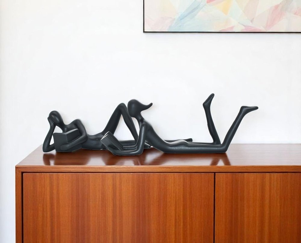 Set of Two Black Resin People Tabletop Sculpture