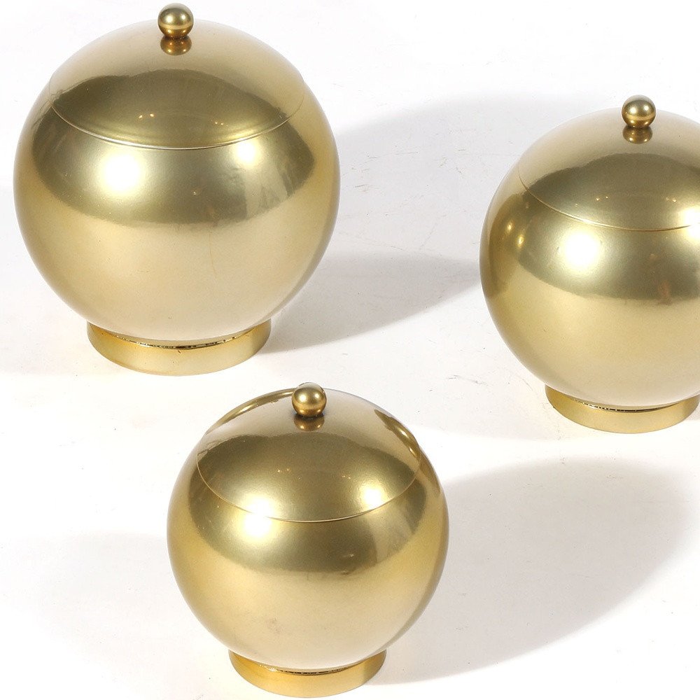 Set of Three Gold Metal Decorative Lidded Canisters