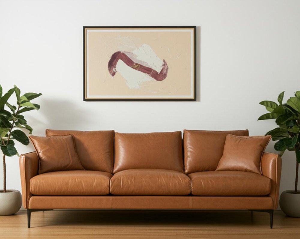 86" Tan Leather Sofa And Toss Pillows With Black Legs