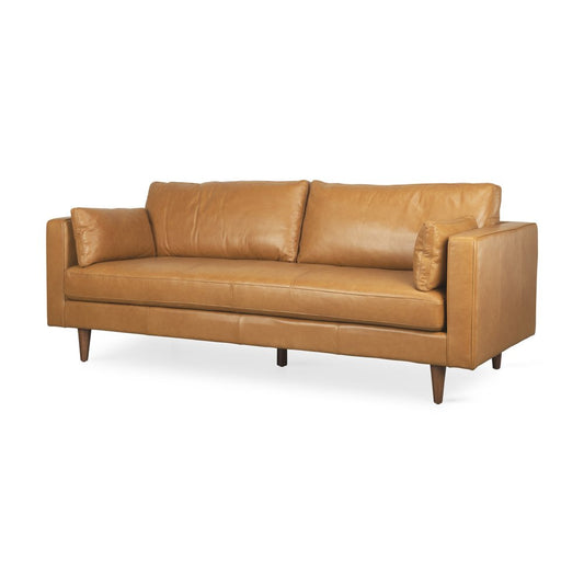 88" Tan Leather Sofa And Toss Pillows With Brown Legs