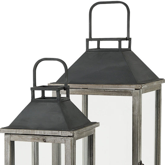 Set of Two Black Distressed Geometric Metal And Solid Wood Tabletop Lantern Candle Holders