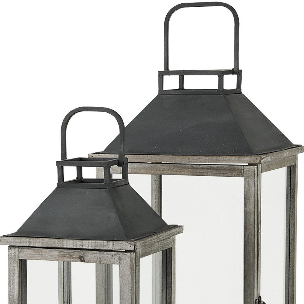 Set of Two Black Distressed Geometric Metal And Solid Wood Tabletop Lantern Candle Holders