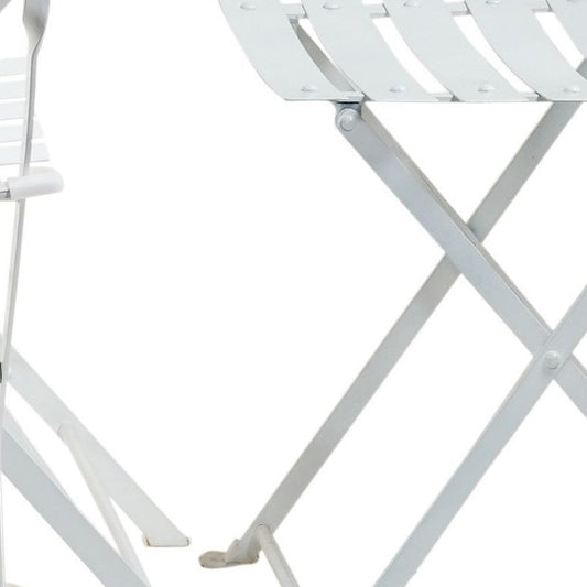 Five Piece White Round Metal Dining Set with Four Chairs