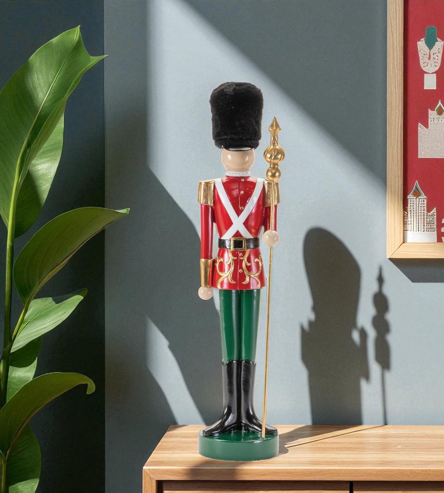 19" Black Red And Green Resin Christmas Nutcracker Tabletop Sculpture