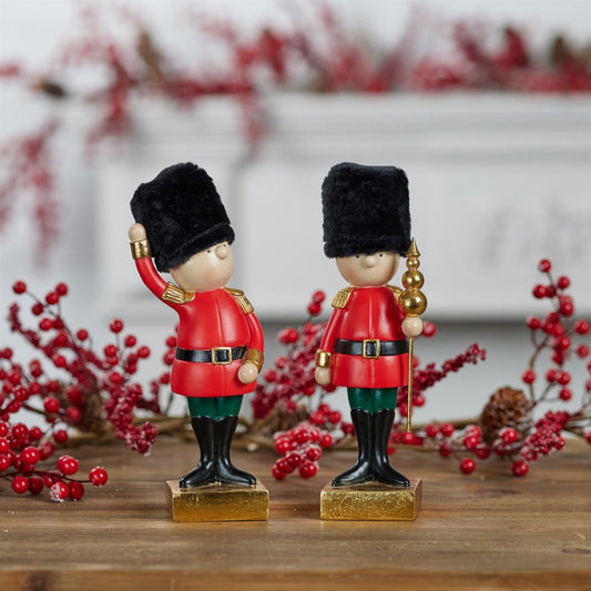 Set of Two Black Gold And Red Polyresin Christmas Nutcracker Figurines