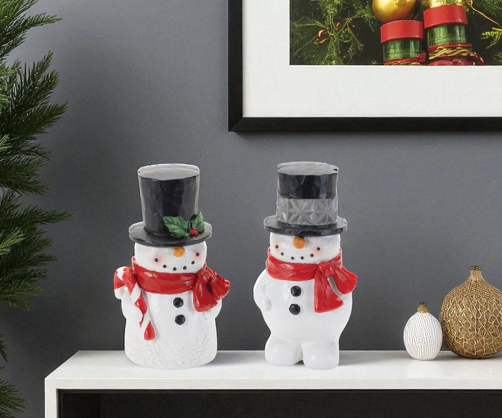 Set of Two White Red And Silver Polyresin Christmas Snowman Figurine