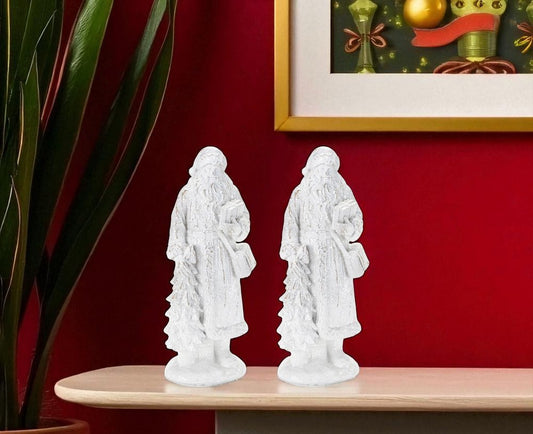 Set of Two White Polyresin Christmas Santa Figurine