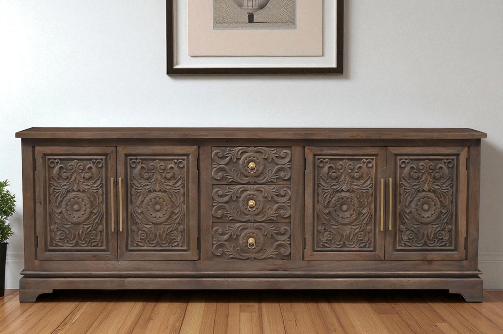 106" Brown Distressed Solid Wood Carved Floral Three Drawer Sideboard with Four Doors