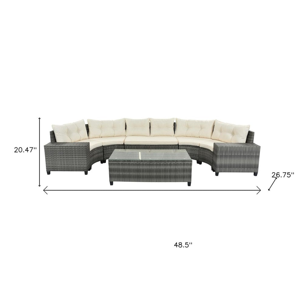 Eight Piece Gray and Beige Wicker Upholstered Cushions Sectional Seating Group With Table