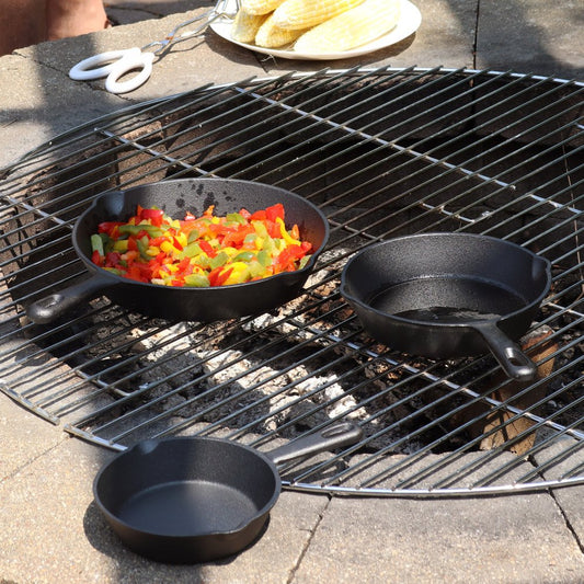 Set of Three Black Cast Iron Frying Pans