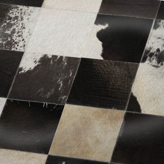 50" X 70" Black Ivory And Beige Animal Print Polyester Woven Plush Throw Blanket