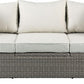 Three Piece Outdoor Gray Wicker Sectional Seating Group with Beige Cushions