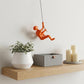 6" X 3" Orange Resin Climbing Man Hanging Dimensional Sculpture