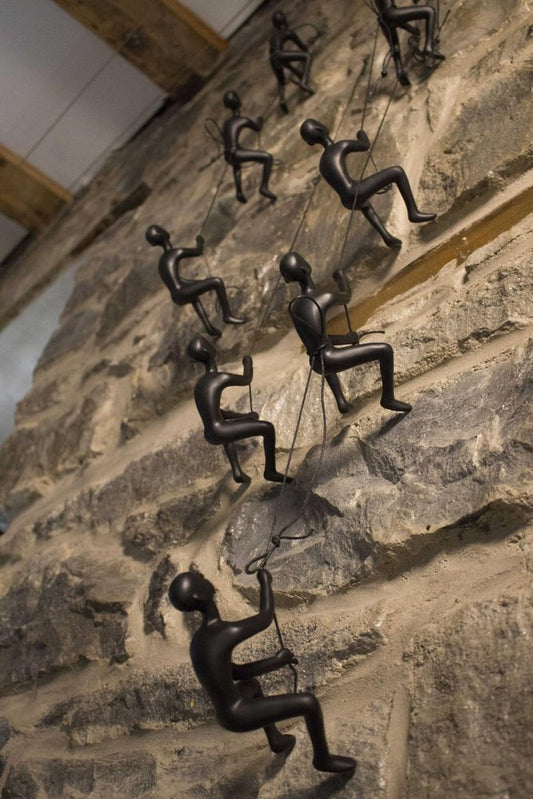 Set of Four Black Resin Climbing Man Hanging Dimensional Sculpture
