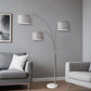 74" Brass Three Light Arc Floor Lamp With Off White Fabric Drum Shade