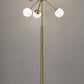 64" Brass Six Light LED Novelty Floor Lamp With White Glass Globe Shades