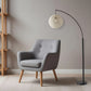 77" Antiqued Bronze Arched Floor Lamp With Groovy Beige Abstract Wicker Globe Shade