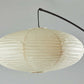 80" Beige And Black Arc Floor Lamp With Beige Paper Globe Shade
