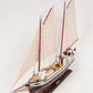 31" Black and White Solid Wood Hand Painted Model Boat Tabletop Sculpture