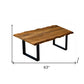 63" Brown And Black Solid Wood Sled Base Dining Table