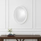 Oval Mirror In A Glossy White Wood Frame