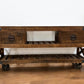 18" Brown and Black Solid Wood Distressed Wheel Console Table With Shelves And Drawers