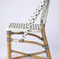 21" Black And White Woven Faux Rattan Outdoor Dining Chair