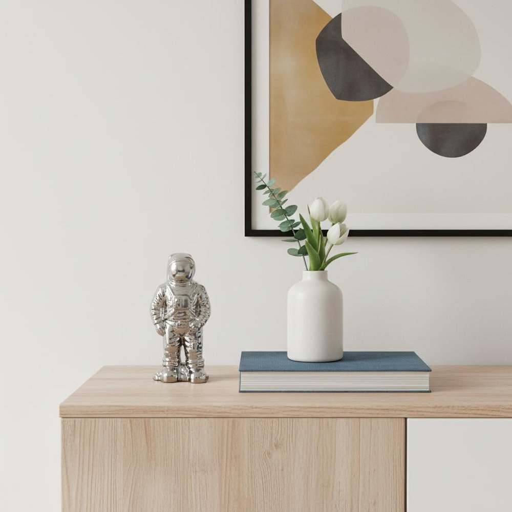 Over The Moon Silverplated Astronaut Sculpture