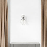One Light Silver Wall Sconce with Round Glass Shade