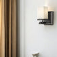 One Light Bronze Frosted Glass Wall Sconce