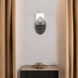 One Light Bronze Wall Light with Clear Glass Shade