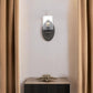 One Light Bronze Wall Light with Clear Glass Shade