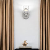 One Light Silver Wall Light with Clear Glass Shade
