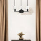 Three Light Matte Black Wall Light with Clear Glass Shade