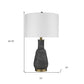26" Distressed Black and Gold Ceramic Table Lamp With White Drum Shade