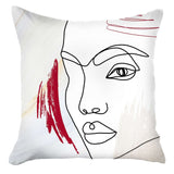 18" Ivory Black And Red Abstract Face Fabric Throw Pillow