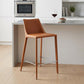 26" Terra Cotta Faux Leather And Steel Low Back Counter Height Bar Chair