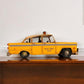 13" Yellow Metal Hand Painted NYC Taxi Tabletop Sculpture