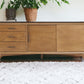 64" Brown TV Stand with Drawers and Sliding Door