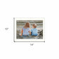 Boy and Girl Sitting White Framed Print Wall Art