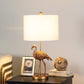 26" Gold Flamingo Table Lamp With White Drum Shade