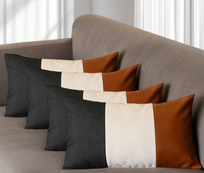 Set of Four 12" X 20" Black Ivory and Brown Color Block Fabric and Faux Leather Lumbar Throw Pillows