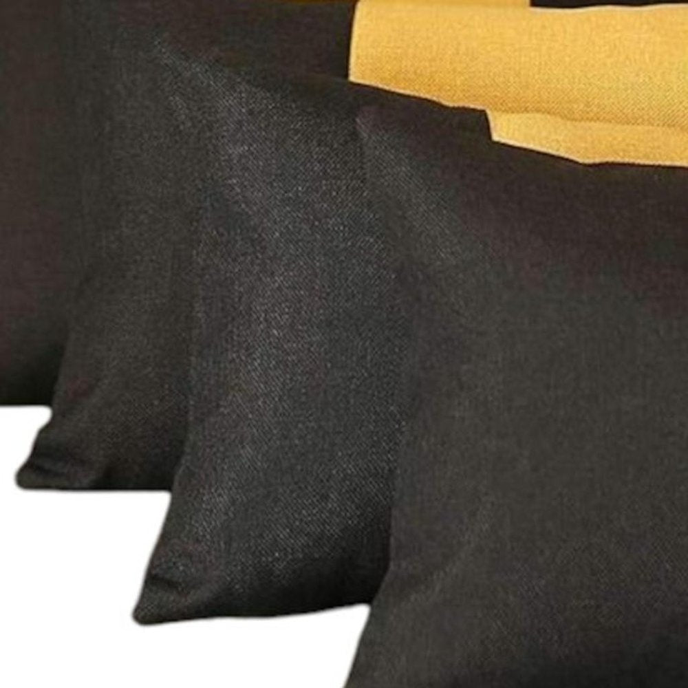 Set of Four 12" X 20" Black And Yellow Lumbar Throw Pillows